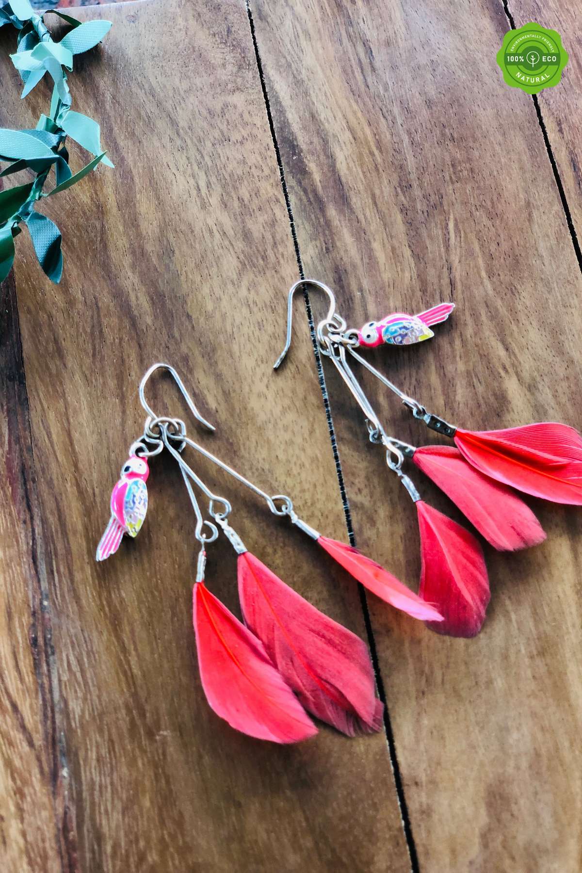 Red feathered earrings